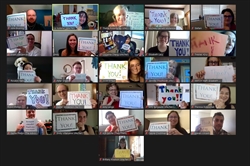 [ai] A virtual group of people on a video call, each holding signs that say "Thank You!" in various colorful styles. The participants include diverse individuals, all expressing gratitude.